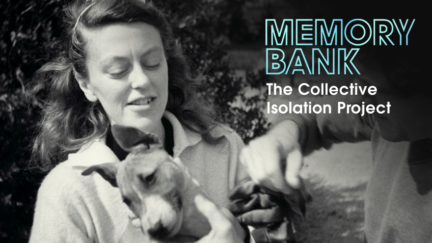 A young woman looks fondly at the dog she's holding